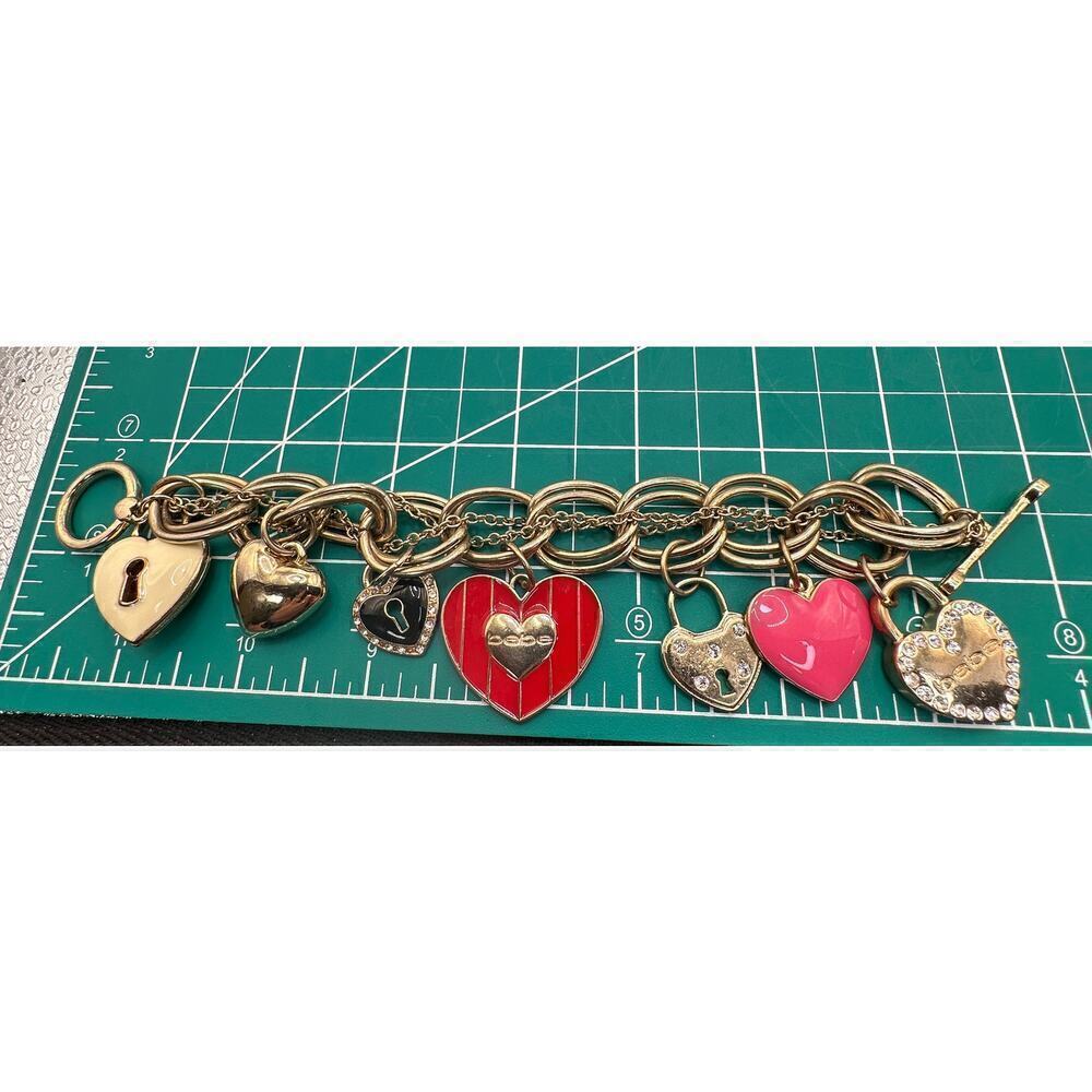 Bebe Gold Tone Charm Bracelet Heart and Lock